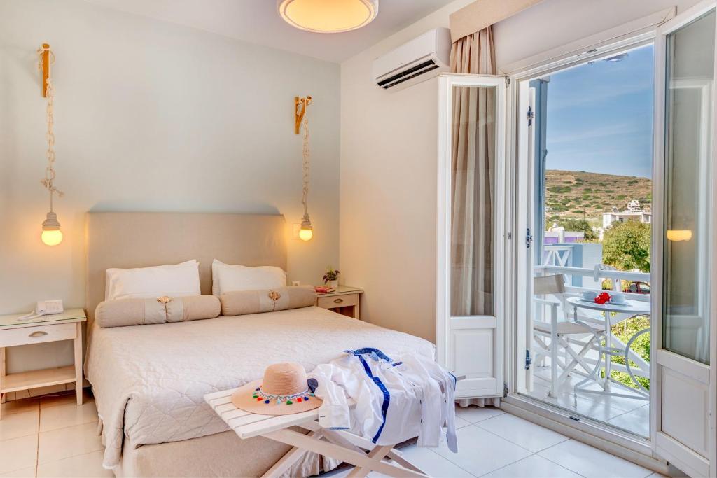 Кровать или кровати в номере Hotel Benois