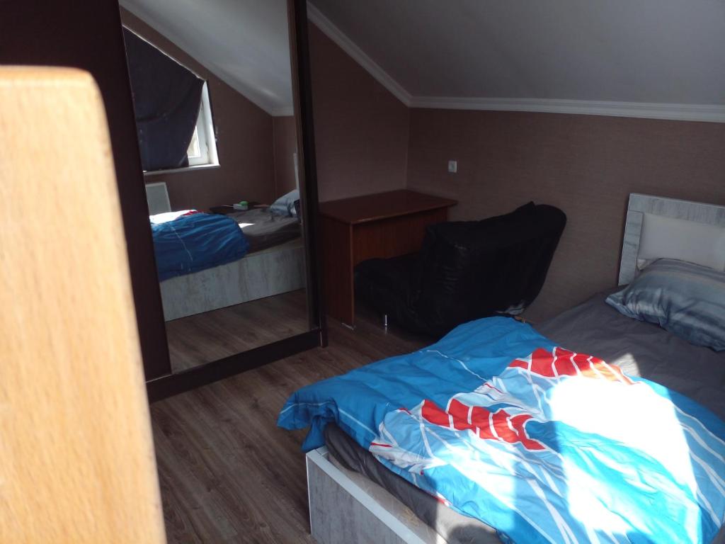 Postel nebo postele na pokoji v ubytování BLUE Hostel - check message after booking