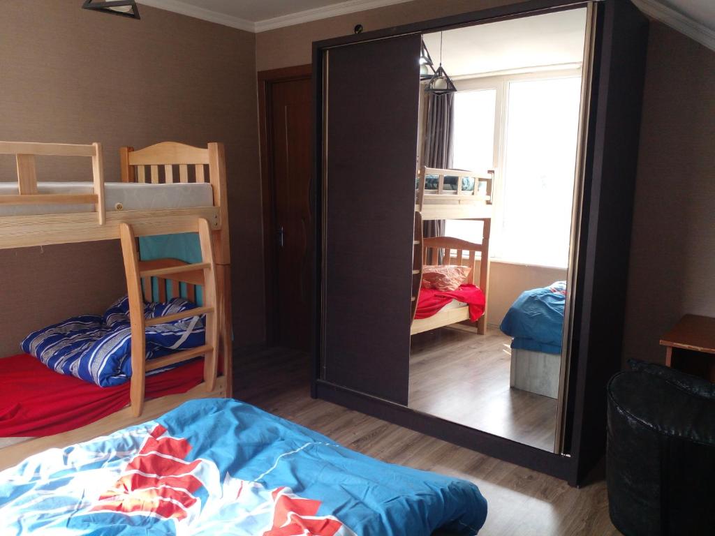 Postel nebo postele na pokoji v ubytování BLUE Hostel - check message after booking