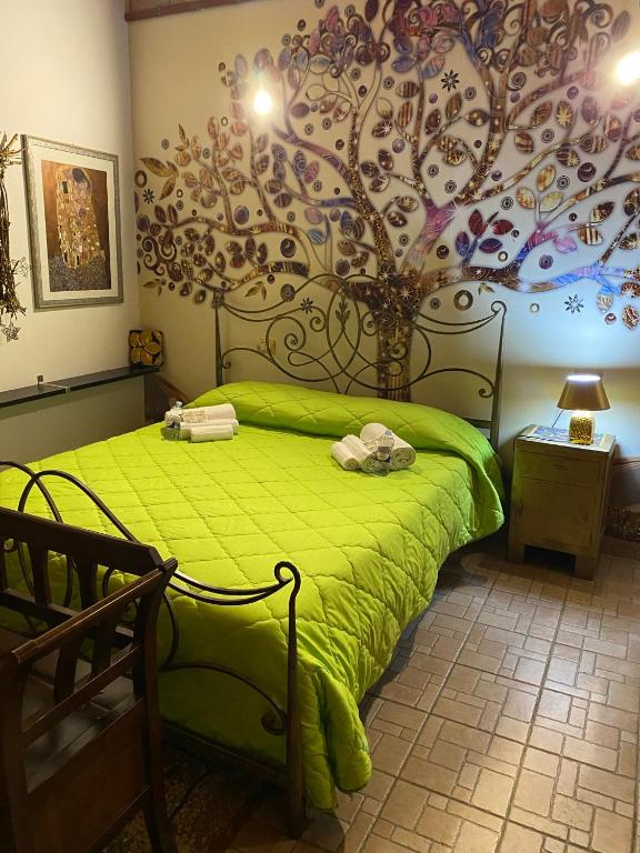 Llit o llits en una habitació de B&B L'Infiorescenza new