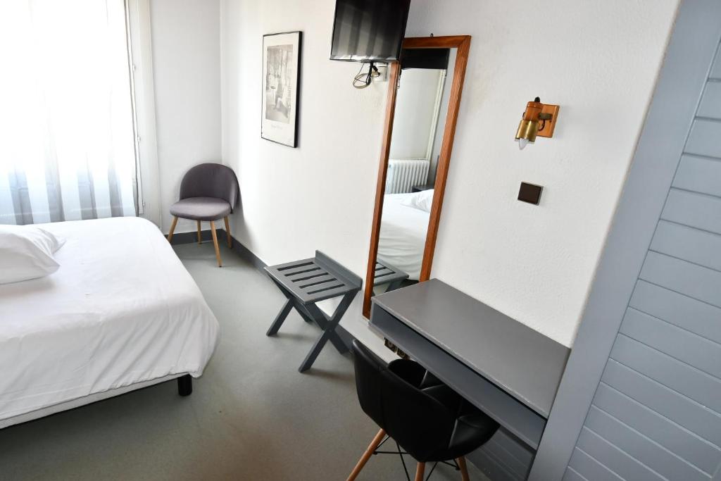 Postel nebo postele na pokoji v ubytování Le Pasteur