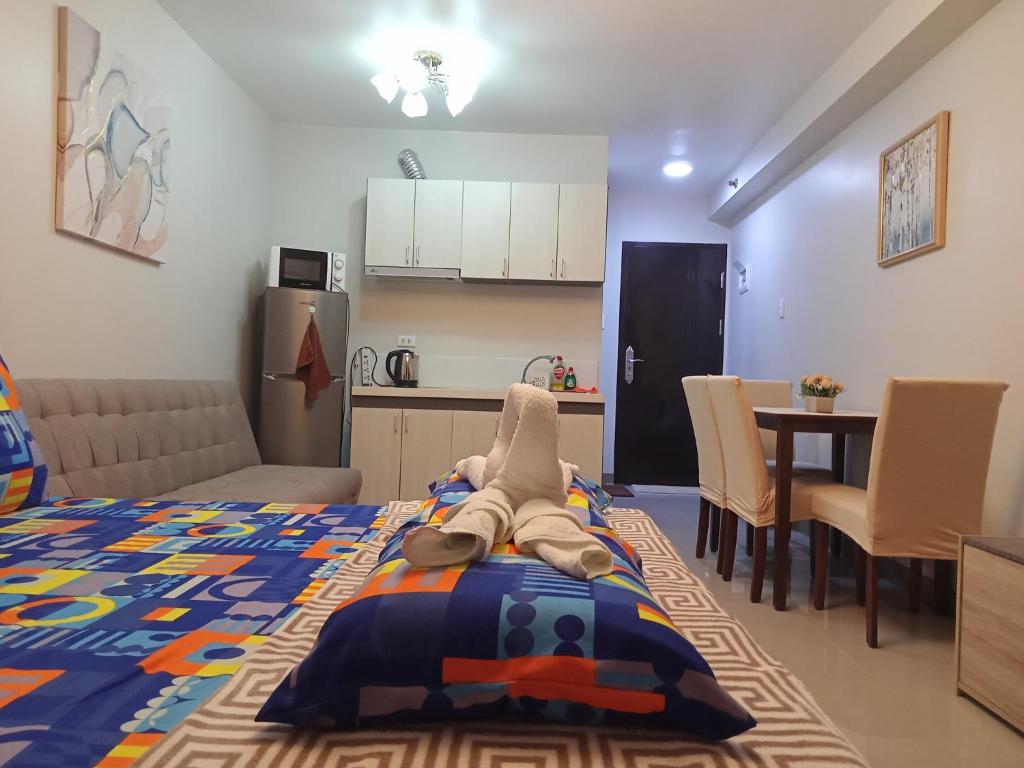 Letto o letti in una camera di Saekyung Condominium