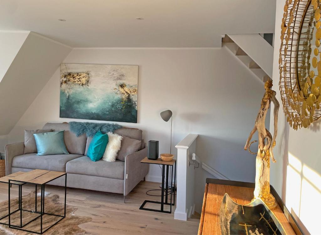 Posezení v ubytování Ferienwohnung Wattteufel
