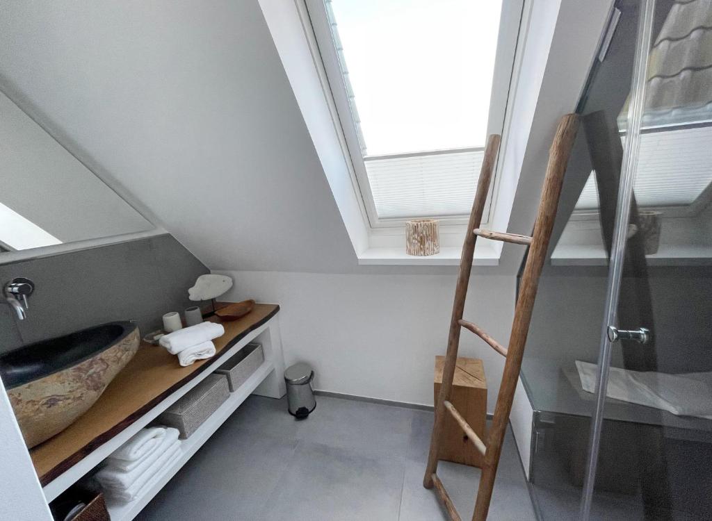 Postel nebo postele na pokoji v ubytování Ferienwohnung Wattteufel