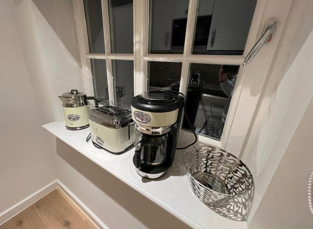 Příslušenství pro přípravu čaje a kávy v ubytování Ferienwohnung Wattteufel