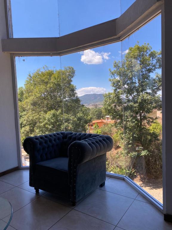 Posezení v ubytování Herradura VIP Inn