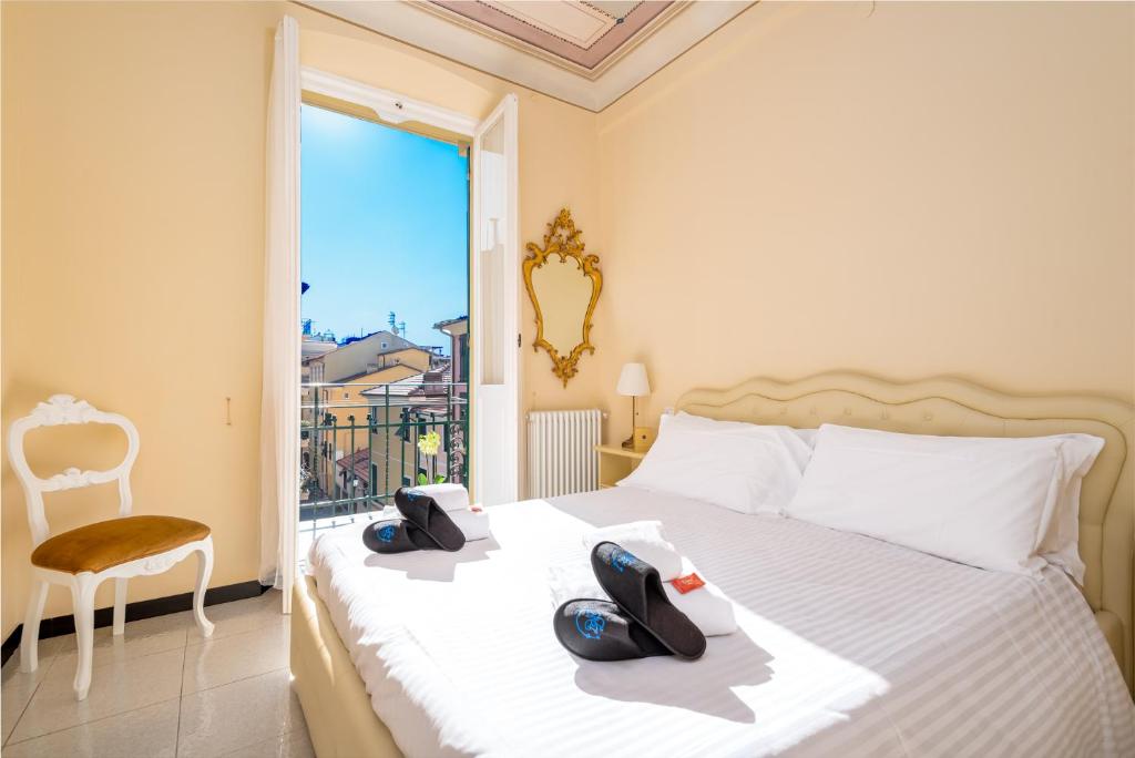 A bed or beds in a room at Appartamento Lalla Fedè