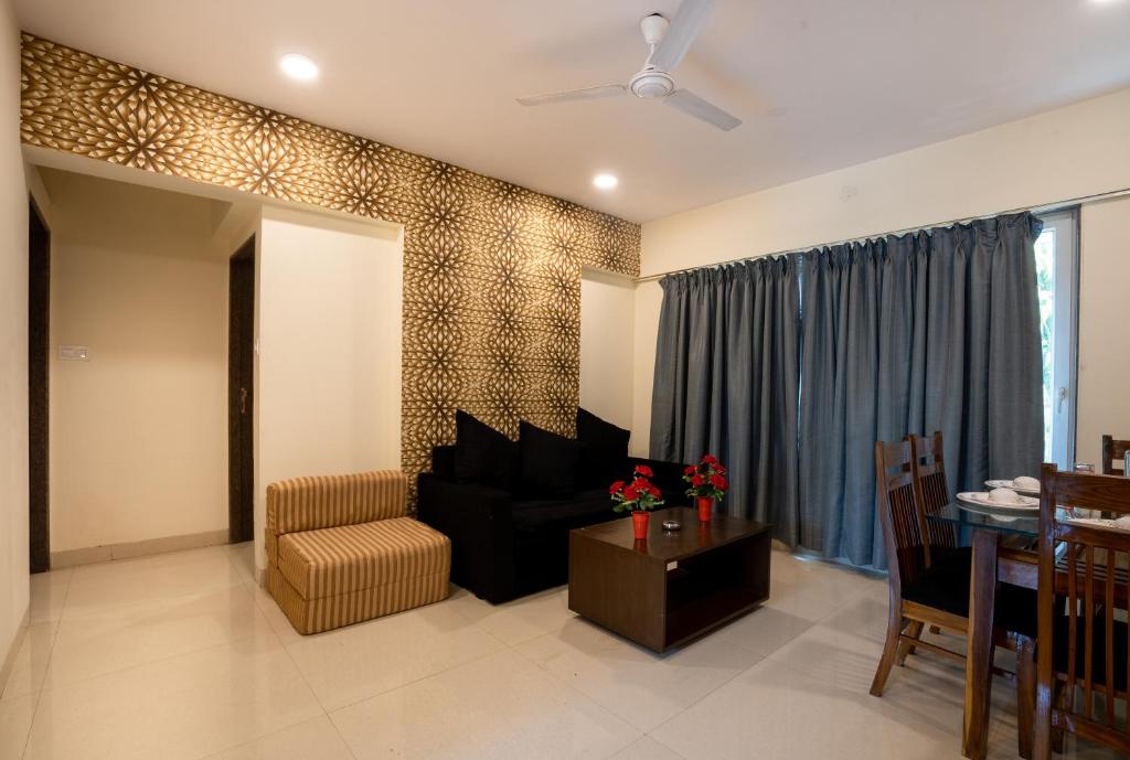 Posezení v ubytování Home2 Suites and Service Apartments, Mumbai Airport
