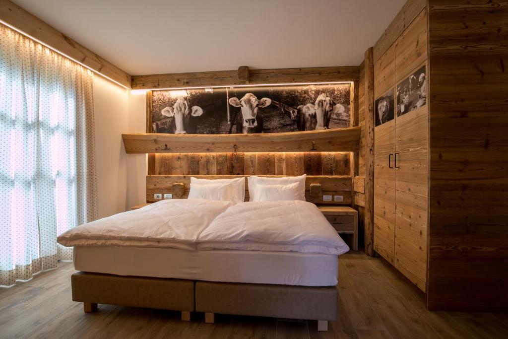 Postel nebo postele na pokoji v ubytování Agriturismo Malga Piè