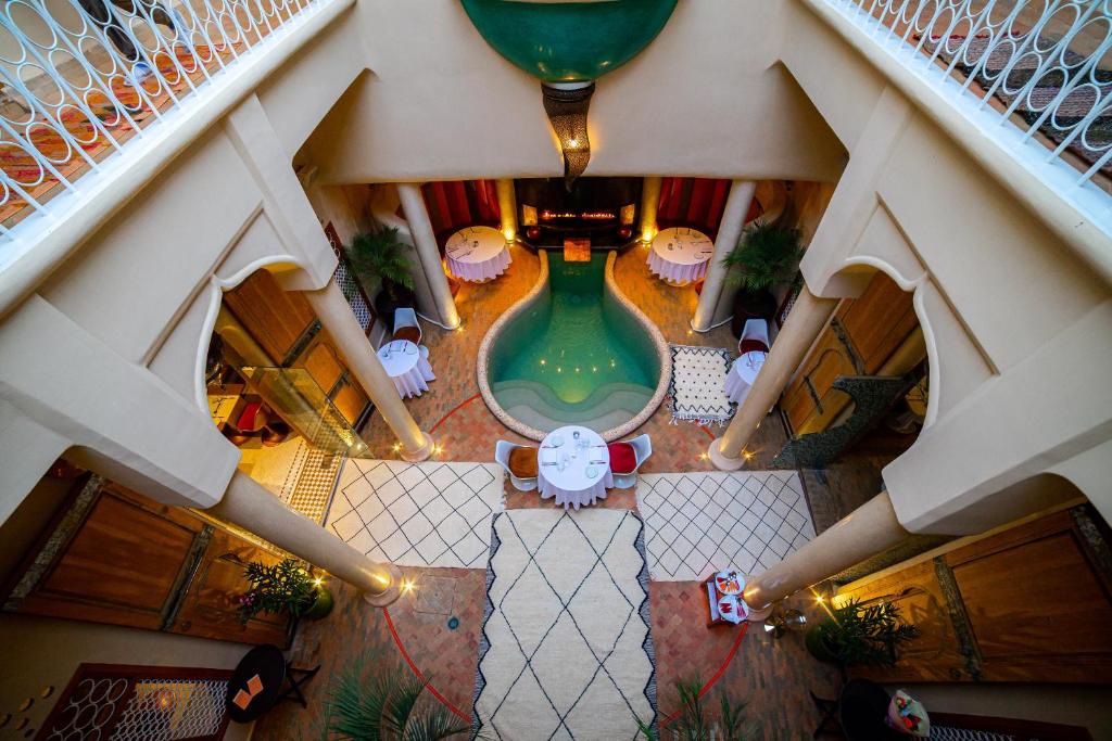 an overhead view of a pool in a building at MAISON MK Adults ONLY - Music Riad in Marrakesh