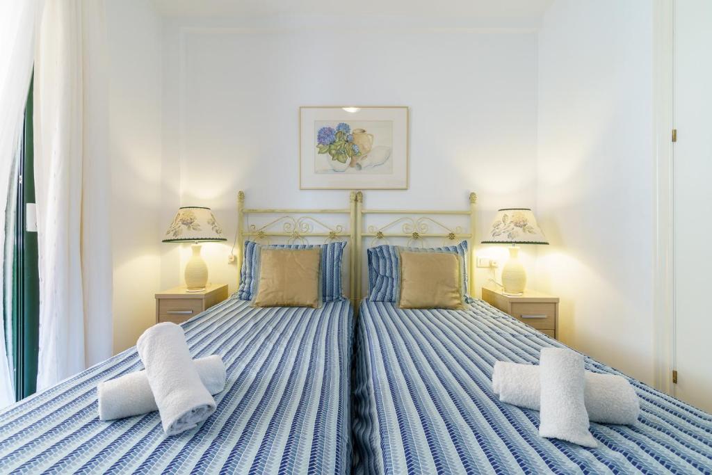 Łóżko lub łóżka w pokoju w obiekcie CT 139 - Cumbres de Riviera - Penthouse