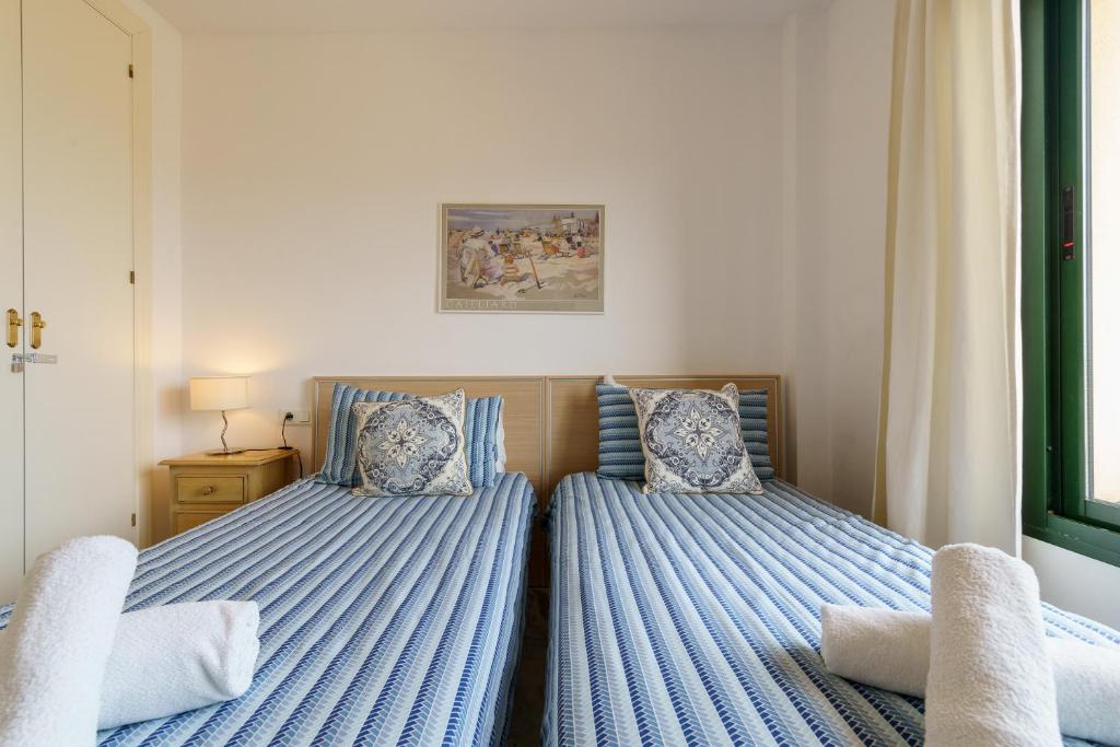Łóżko lub łóżka w pokoju w obiekcie CT 139 - Cumbres de Riviera - Penthouse