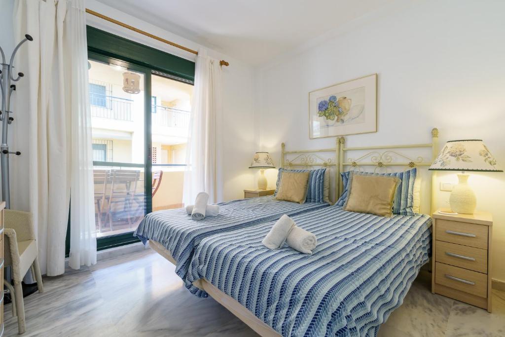 Łóżko lub łóżka w pokoju w obiekcie CT 139 - Cumbres de Riviera - Penthouse