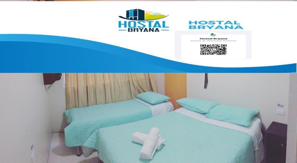 Postel nebo postele na pokoji v ubytování Hostal Bryana Inn Baños