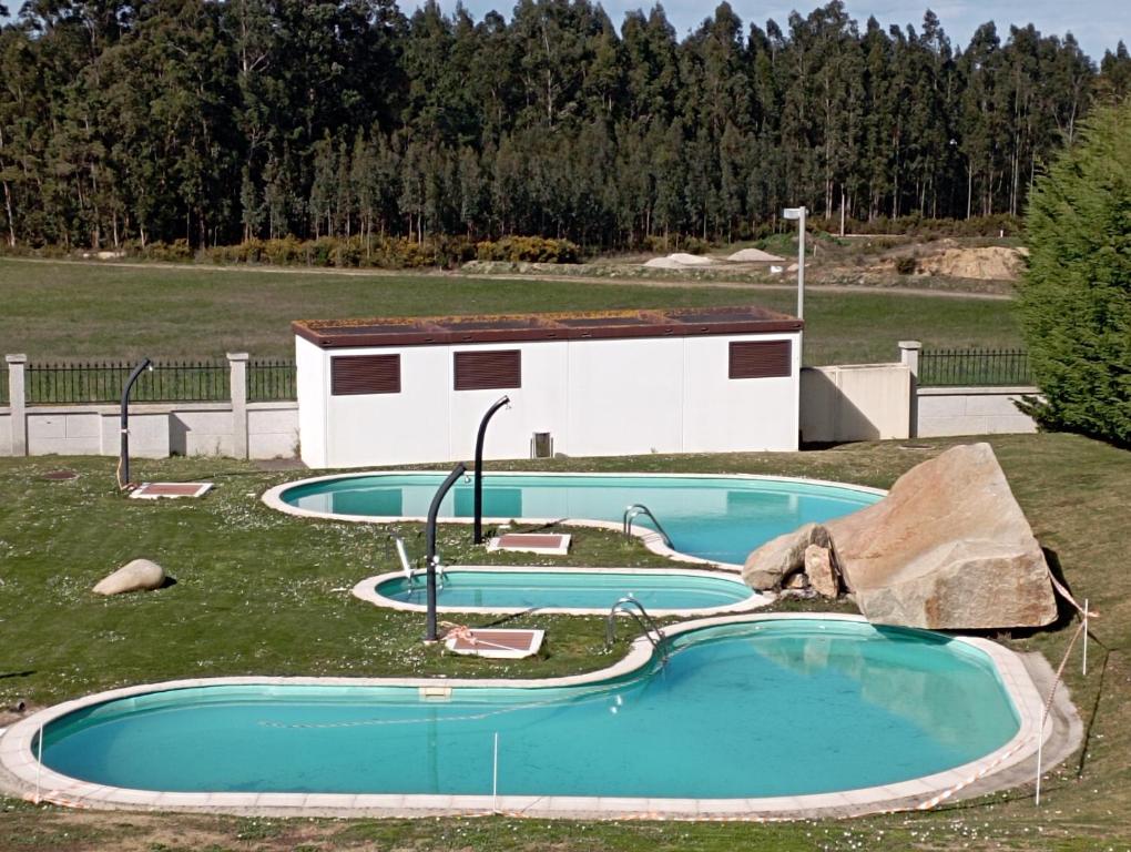 Bazén v ubytování Apartamento, Ático, Casa, PLAYA LAS CATEDRALES nebo v jeho okolí