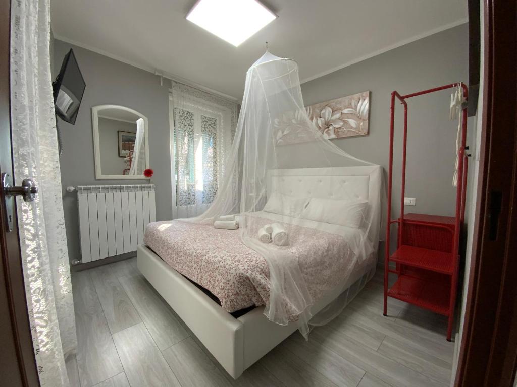 Posteľ alebo postele v izbe v ubytovaní CASA CAMELIE