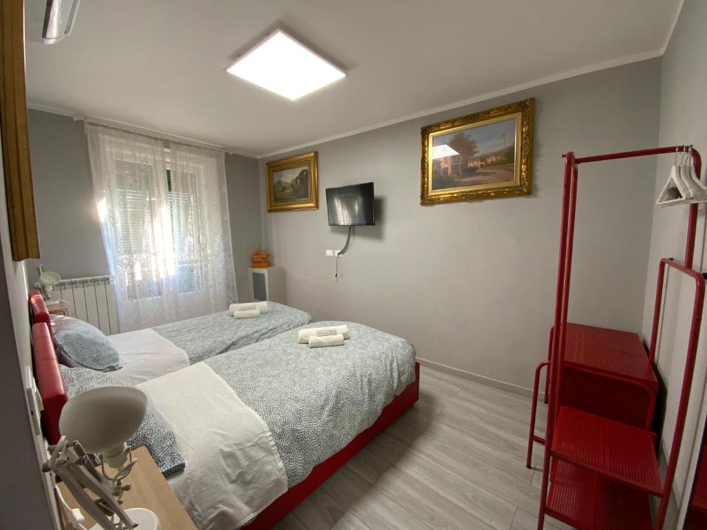 Posteľ alebo postele v izbe v ubytovaní CASA CAMELIE
