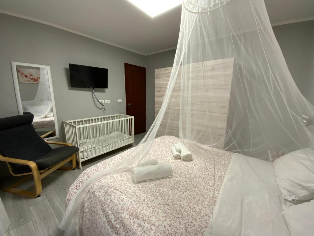 Posteľ alebo postele v izbe v ubytovaní CASA CAMELIE