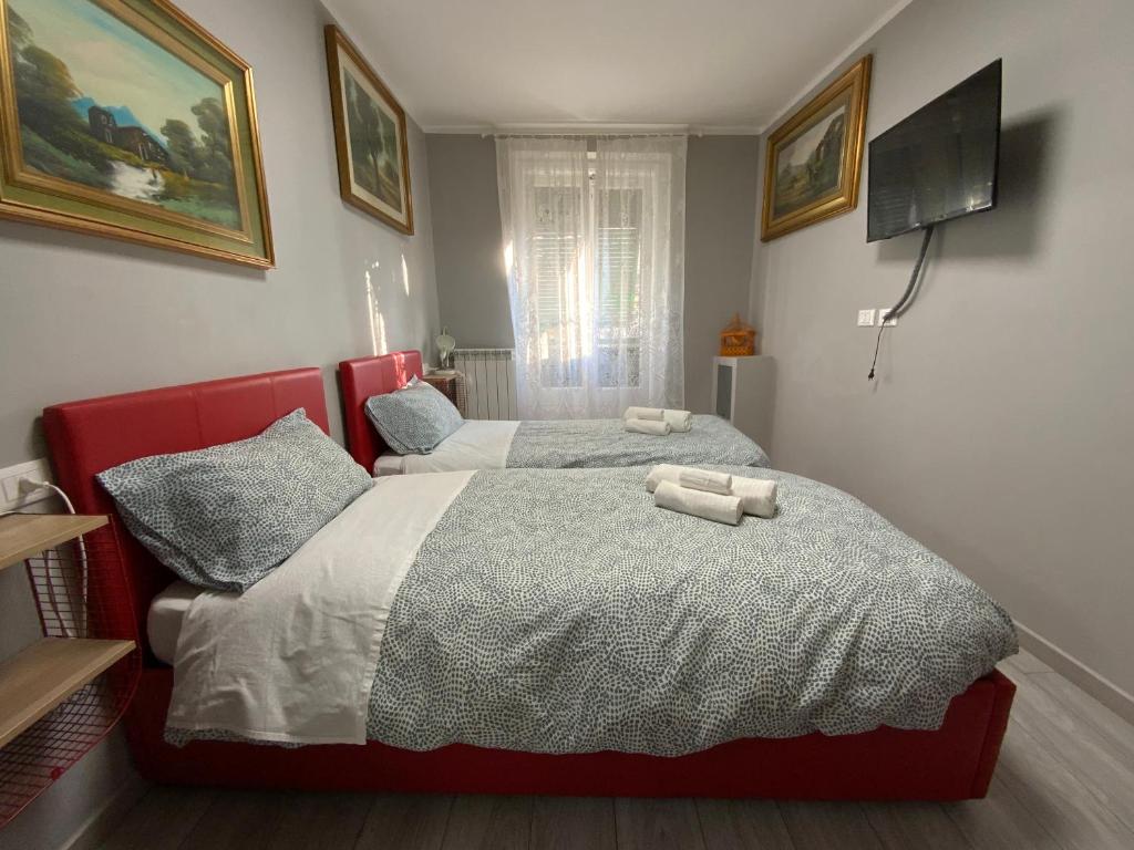 Posteľ alebo postele v izbe v ubytovaní CASA CAMELIE