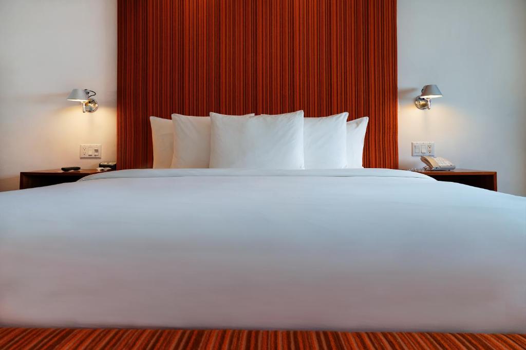 Postel nebo postele na pokoji v ubytování The Tony Hotel South Beach