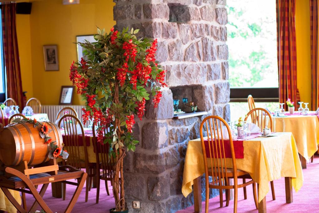 Restaurace v ubytování Le Grand Hôtel de Besse