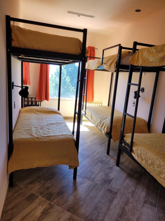 Postel nebo postele na pokoji v ubytování Astrolabio Hostel