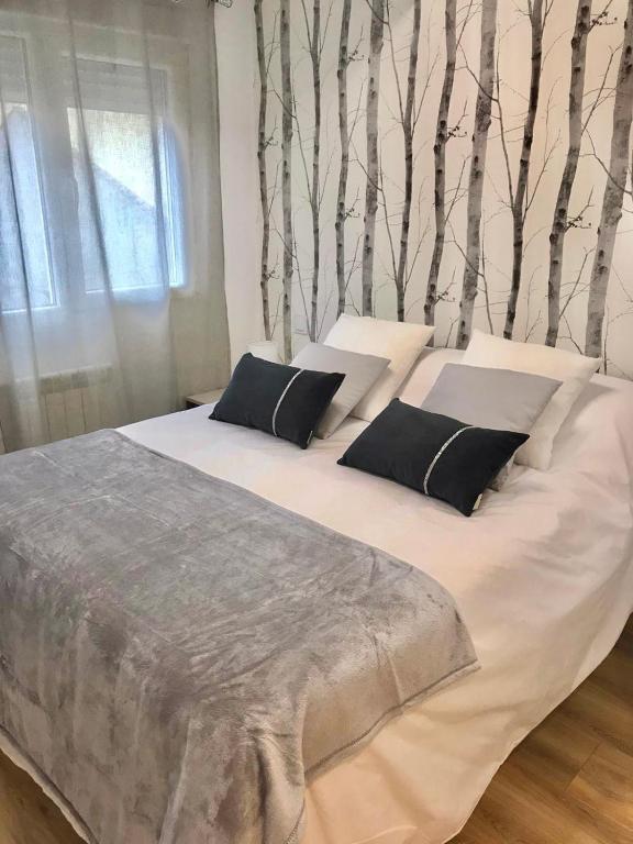 Postel nebo postele na pokoji v ubytování VUT REAL DE ARRIBA