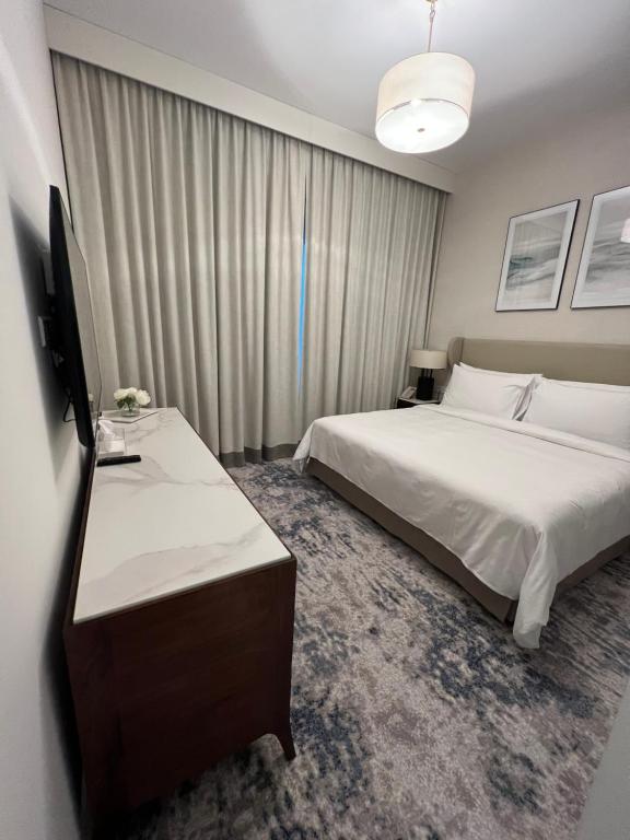 Postel nebo postele na pokoji v ubytování Apartment Fujairah
