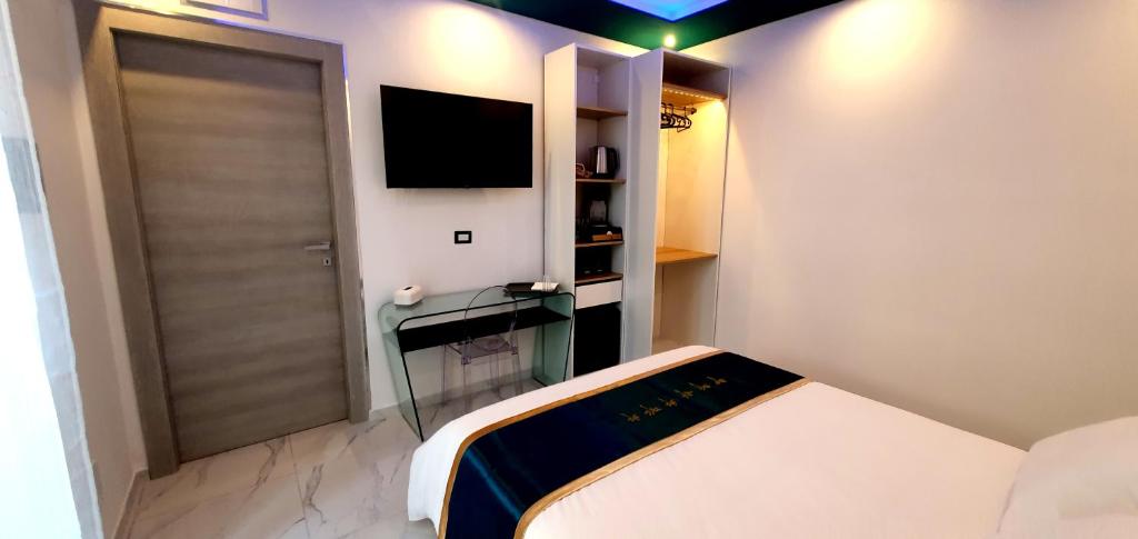 TV a/nebo společenská místnost v ubytování Ercolano Luxury Suite
