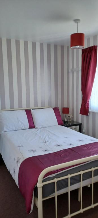 Postel nebo postele na pokoji v ubytování alicias chalets