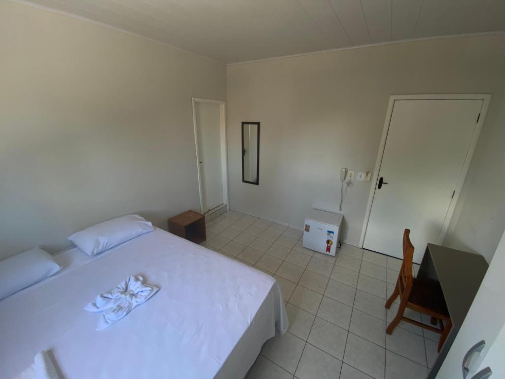 Postel nebo postele na pokoji v ubytování Hotel Bianchi