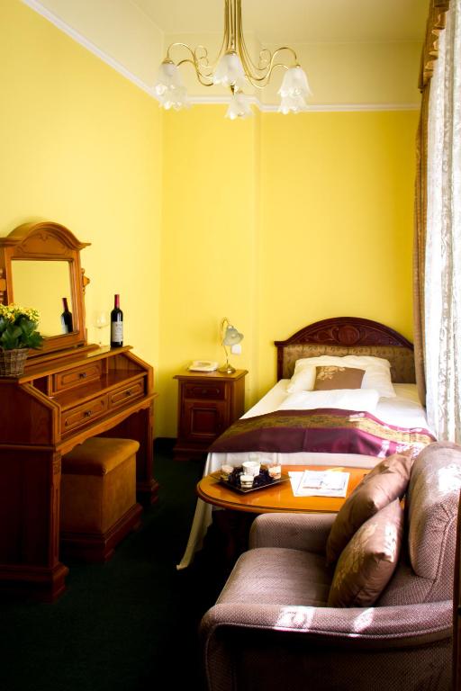 Postel nebo postele na pokoji v ubytování City Hotel UNIO superior