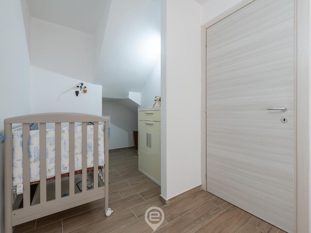 Posteľ alebo postele v izbe v ubytovaní Villa Monica - Suite Scirocco