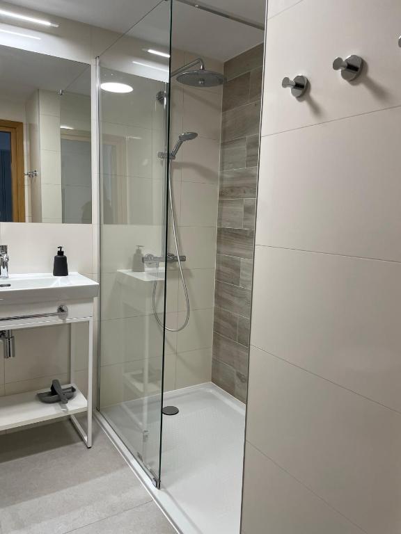 Kúpeľňa v ubytovaní Seaside Park Hotel Kołobrzeg apartament 27 metrów szczęścia