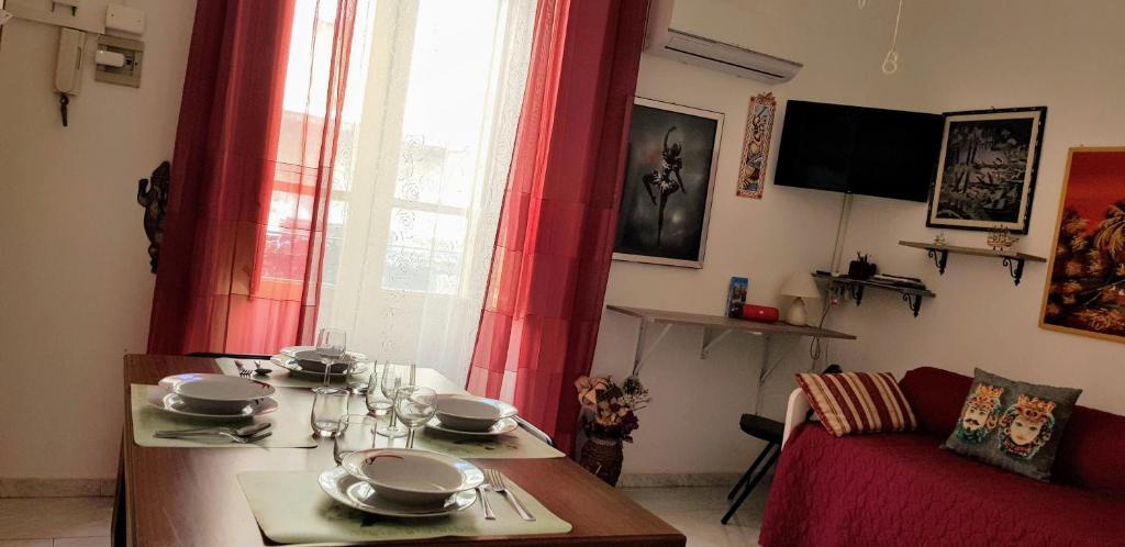 A television and/or entertainment centre at Casa Albergheria
