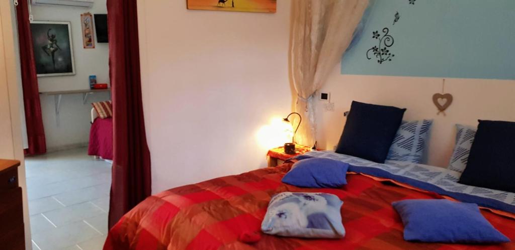 A bed or beds in a room at Casa Albergheria