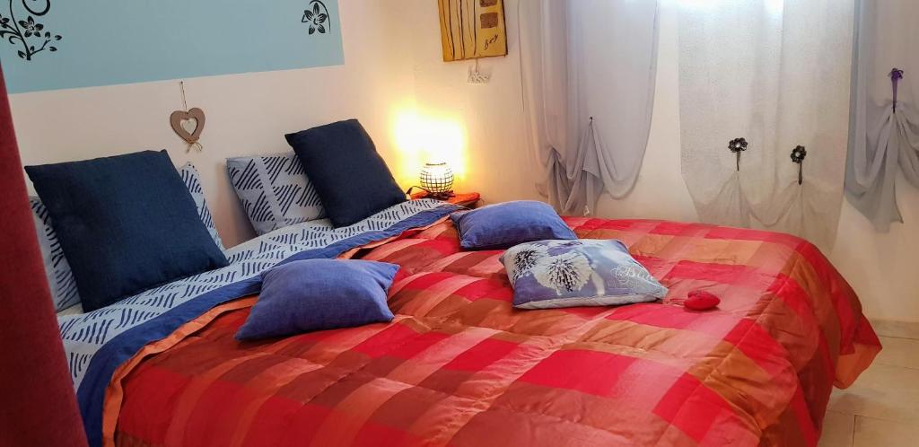 A bed or beds in a room at Casa Albergheria