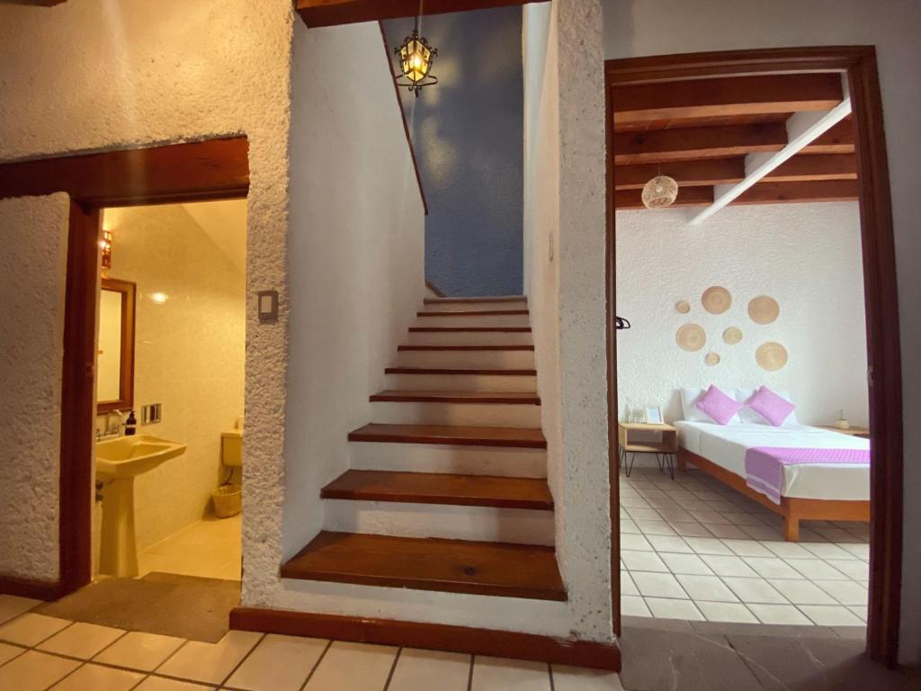 Postel nebo postele na pokoji v ubytování Casa Mayo B&B