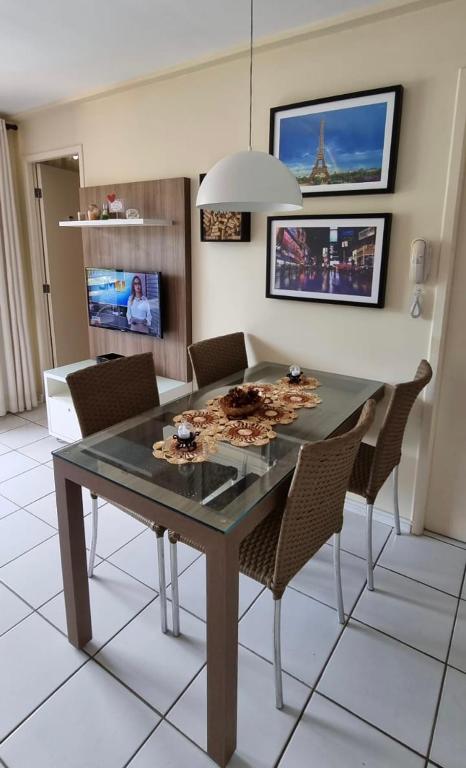 TV a/nebo společenská místnost v ubytování Gran Lençóis Flat Residence