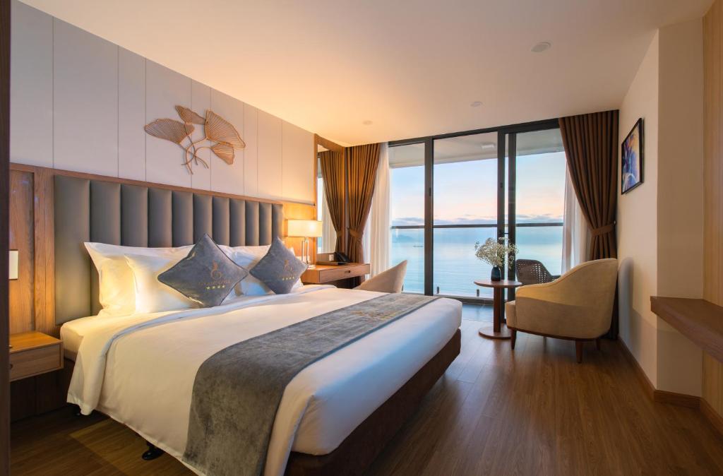 Postel nebo postele na pokoji v ubytování Grand Gosia Hotel