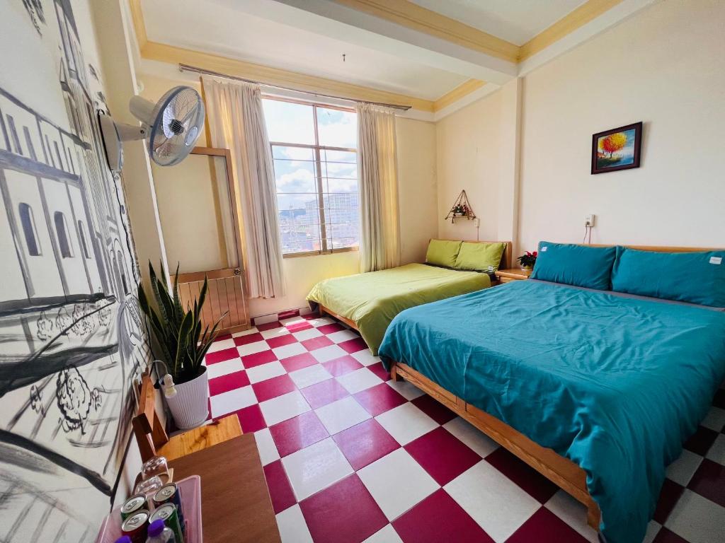 Postel nebo postele na pokoji v ubytování Nụ Cười Xinh