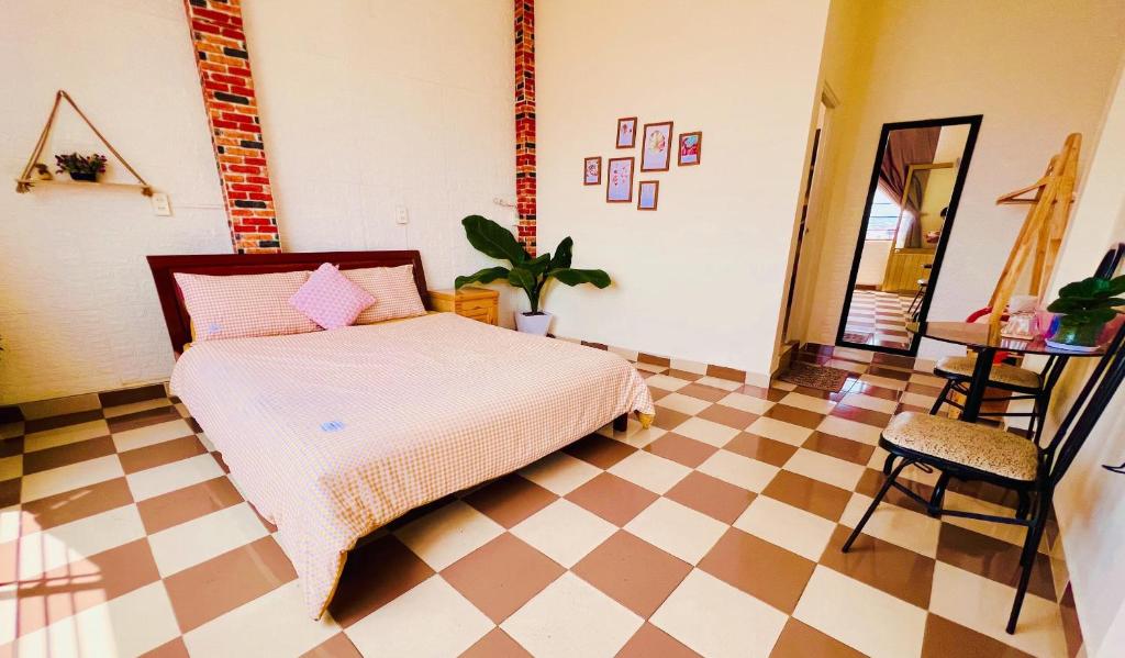 Postel nebo postele na pokoji v ubytování Nụ Cười Xinh