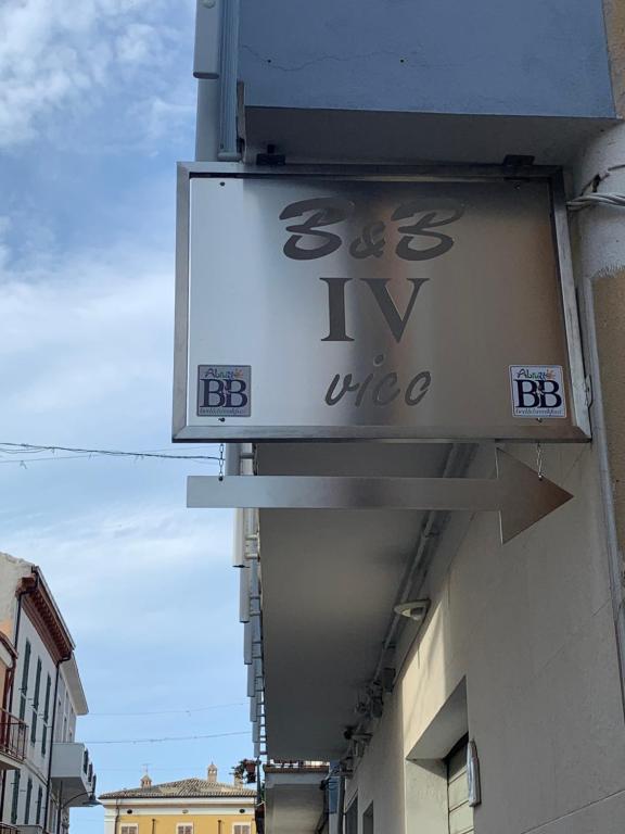 a sign for a tv niche on the side of a building at B&B IV Vico in Miglianico