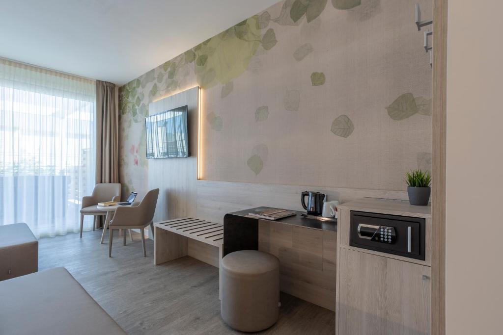 TV a/nebo společenská místnost v ubytování Hotel Doriana