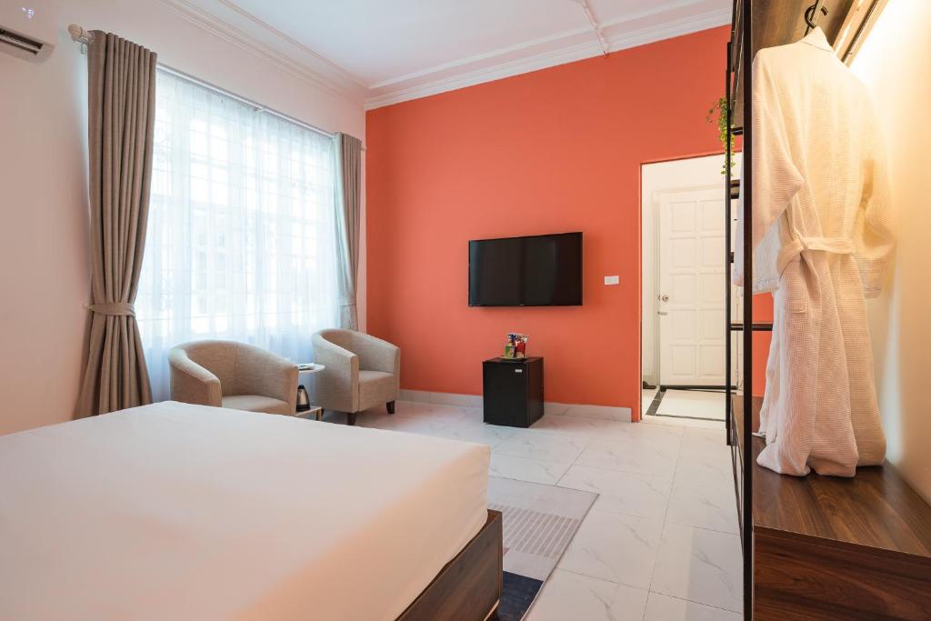 TV a/nebo společenská místnost v ubytování C o r o n a Hanoi House