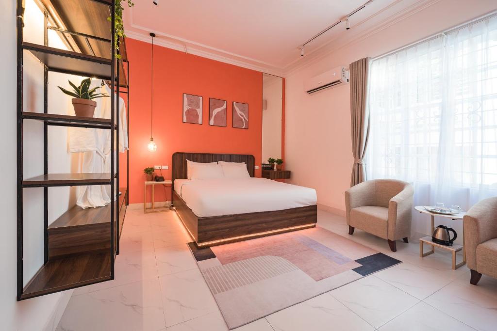 Postel nebo postele na pokoji v ubytování C o r o n a Hanoi House