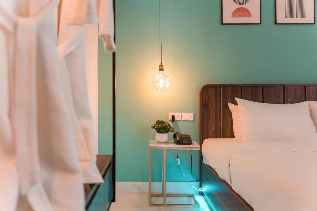 Postel nebo postele na pokoji v ubytování C o r o n a Hanoi House