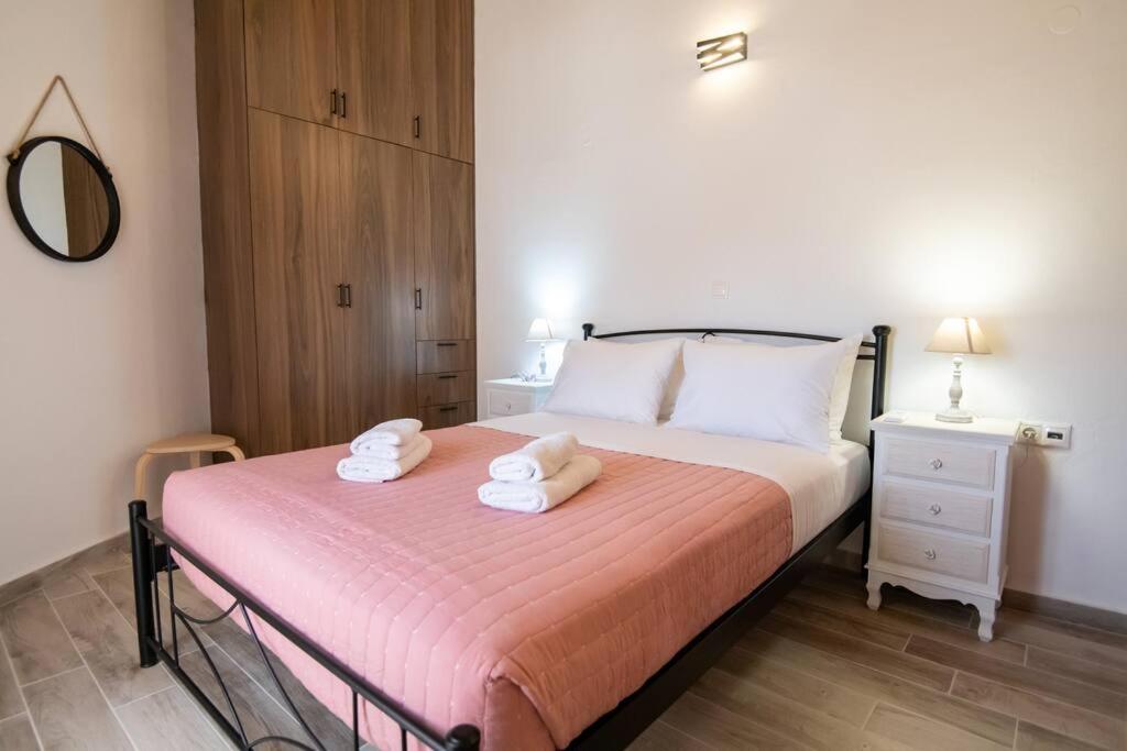 Łóżko lub łóżka w pokoju w obiekcie La Casa Rustica