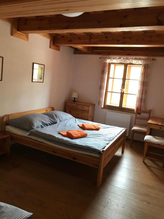 Postel nebo postele na pokoji v ubytování Samota u Hadince