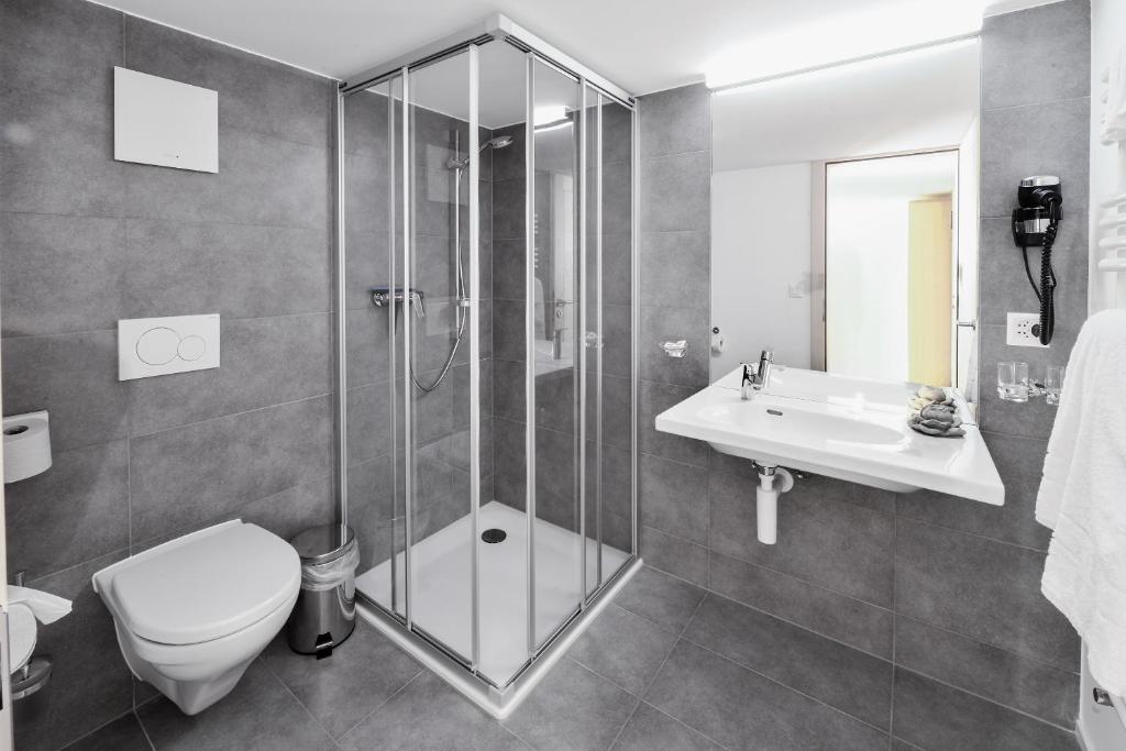 Koupelna v ubytování Hotel Wasserfall